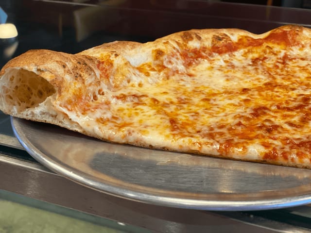 Thin Crust Cheese Slice.